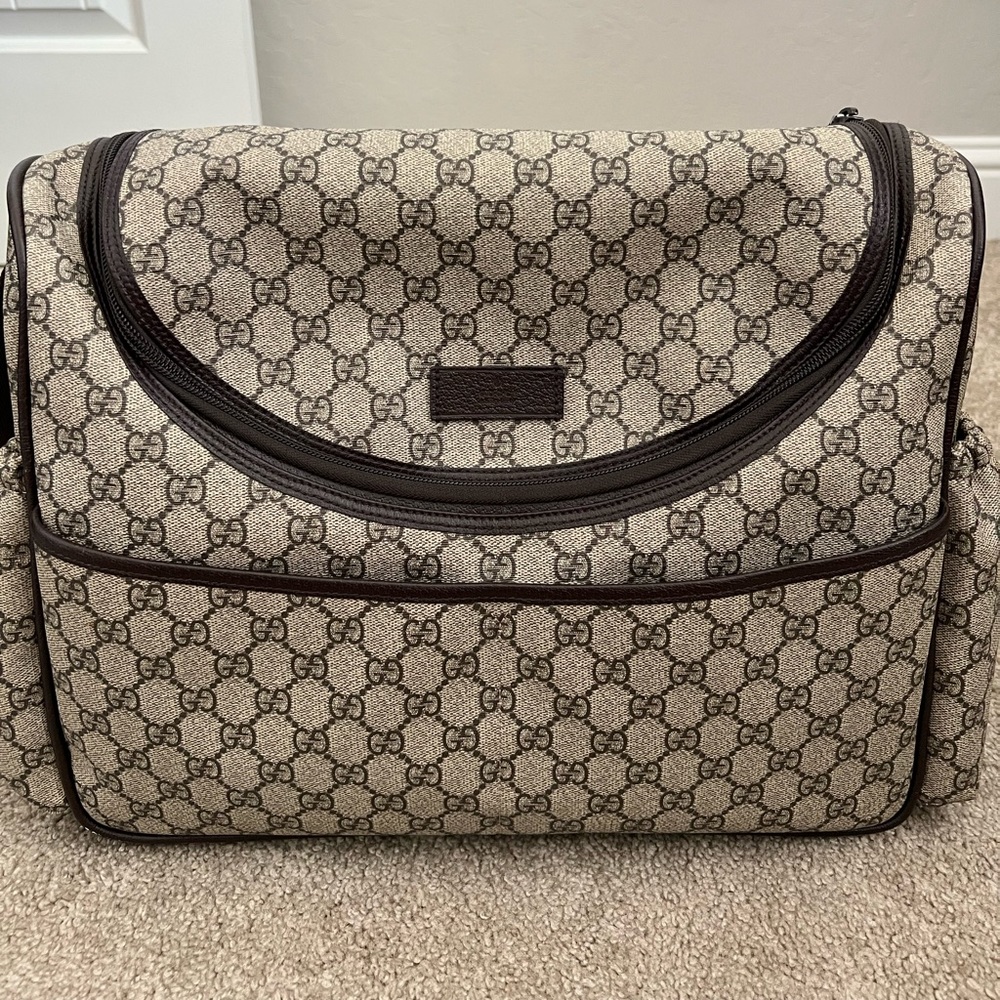 SOLD.  …Gucci monogram canvas diaper bag